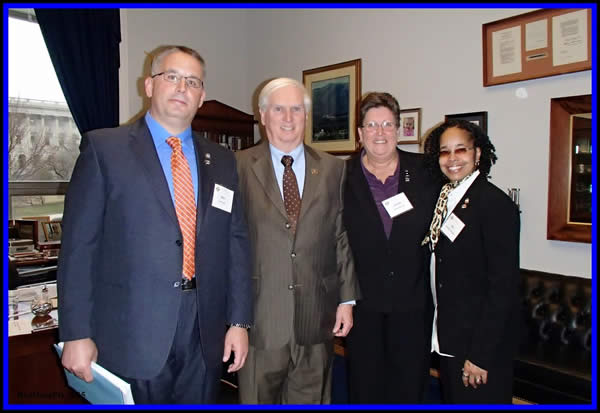 IACLEA Members Troy Lane, Vickie Weaver (Immediate Past President) and Mel Batten-Mickens stand with Representative John J. Duncan, Jr. of Tennesee.
